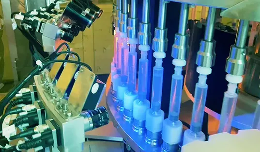 Máquina automática de inspección de jeringas precargadas 